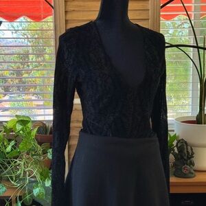 Black velvet mesh long sleeve bodysuit with deep V neckline
